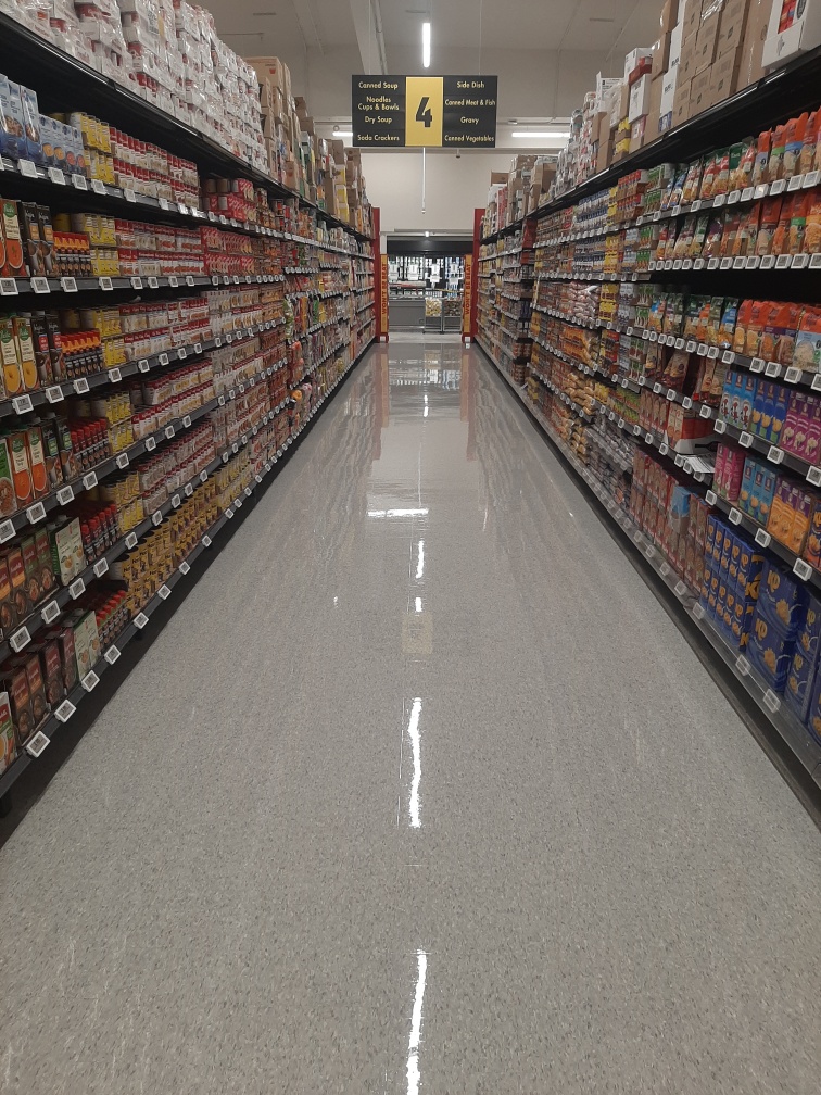 Supermarket aisle after floor care service